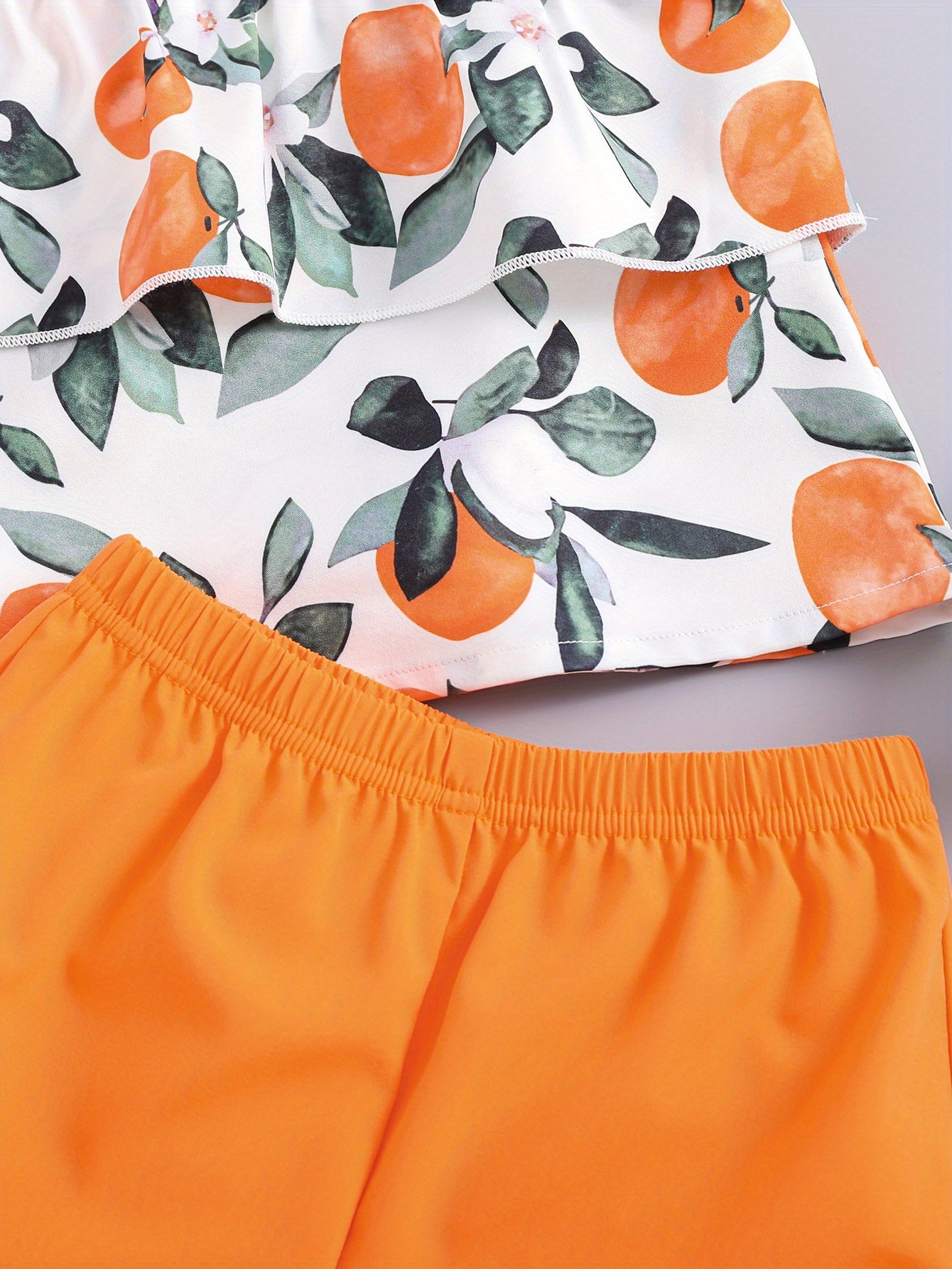 2pcs Girls Fruit Print Layered Hem Bow Cami Top & Elastic Waist Shorts Set Kids Summer Clothes